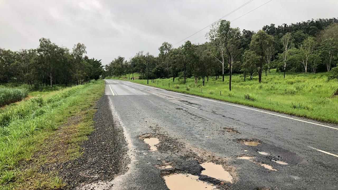 Bruce Highway near Myrtlevale riddled with potholes, posing a hazard to drivers.