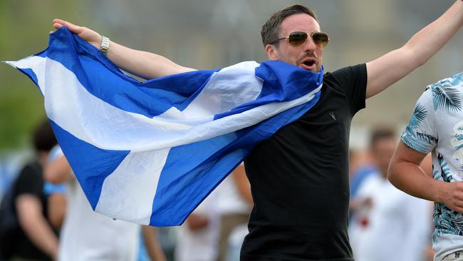 Fans invade the field as Scotland beats England by 6 runs during the One Day International match. Picture: Mark Runnacles/Getty Images