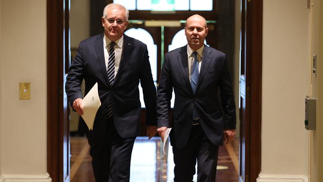 Prime Minister Scott Morrison with Josh Frydenberg hold a press conference after the first interest rates rise in a decade. Picture: Jason Edwards