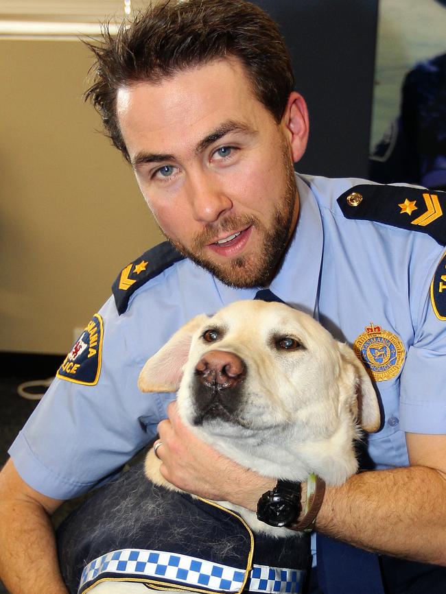 Senior Constable Jareth Anderson with Yuli.