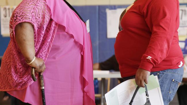 Images like this are always used to depict the ‘obesity epidemic’. Imagine if you saw your self in one of them. Picture: Mark Lennihan/AP