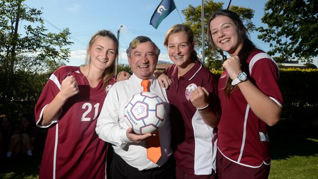 Cleveland District State High School principal Paul Bancroft with students Casey Willis, Darien Holiday and Danielle Burrage. Photo: Stuart Quinn.