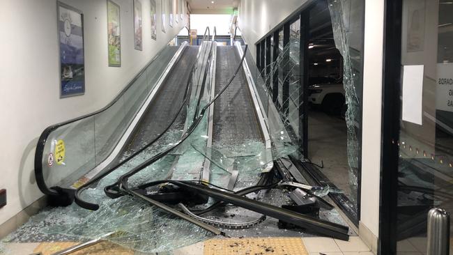 A car crashed through the glass sliding doors at Glenorchy Plaza. Photo: Jarrod Lawler