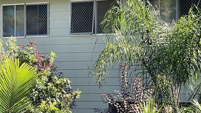 Blood left on the outside of the home where police allege the occupant escaped through the window. Picture: Charlton Hart