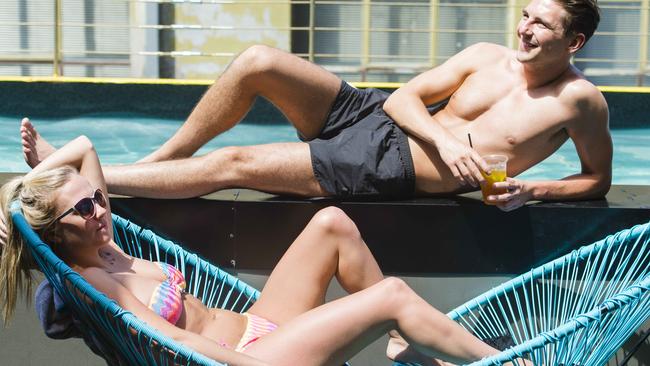 Adelphi Pool Party. Sun seekers enjoy the rooftop pool at the Adelphi Hotel, as part of the Adelphi Hotel Pool Party. Ryan Beal and Jenny Shepherd poolside. Picture: Eugene Hyland