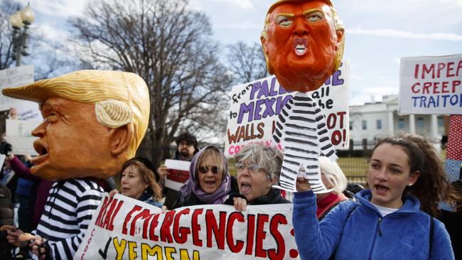 People gather in front of the White House to protest Donald Trump’s national emergency declaration. Picture: AP