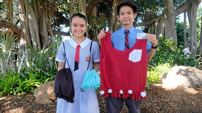 BUDDING BUSINESS OWNERS: Rockhampton Grammar School year eight students Mathew He and Samanta Rimmington have created their own business, making bags out of old t-shirts. Picture: Rachael McDonald  - RGS