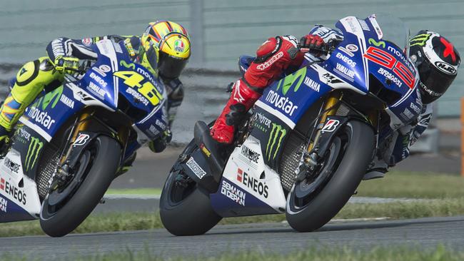 HOHENSTEIN-ERNSTTHAL, GERMANY - JULY 11: Jorge Lorenzo of Spain and Movistar Yamaha MotoGP leads Valentino Rossi of Italy and Movistar Yamaha MotoGP during the MotoGp of Germany - Free Practice at Sachsenring Circuit on July 11, 2014 in Hohenstein-Ernstthal, Germany. (Photo by Mirco Lazzari gp/Getty Images)