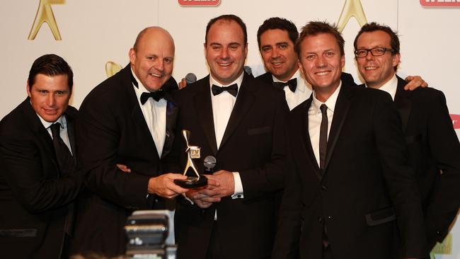 Former The Footy Show colleagues Craig Hutchison (third from left) and Damian Barrett (far right) are offering fans a behind-the-scenes look at AFL journalism in their new podcast, The Sounding Board.