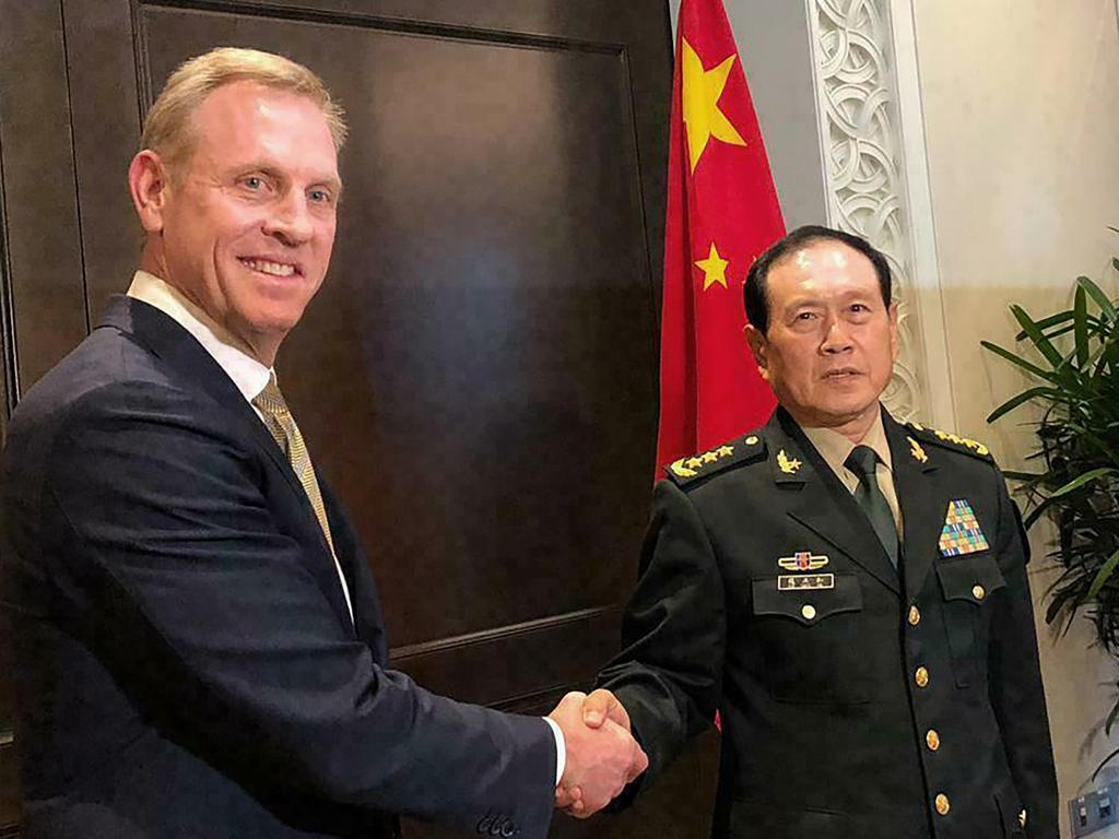 Acting US Secretary of Defense Patrick Shanahan, left, shakes hands with Chinese Minister of National Defense Wei Fenghe during a meeting on the sidelines of the 18th International Institute for Strategic Studies (IISS) Shangri-la Dialogue, in Singapore. Picture: AP