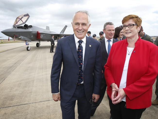 Signed. Sealed. Delivered? Prime Minister Malcolm Turnbull and Defence Minister Marise Payne after inspecting Australia’s new F-35 on the tarmac at Avalon earlier this year. Picture: David Caird