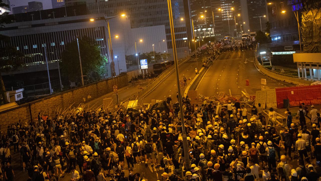 Protesters occupy major roads near Hong Kong's Legislative Council building against a controversial extradition law proposal.