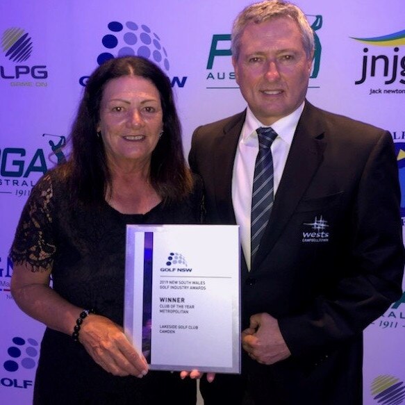 West Group CEO Tony Mathew and executive assistant Karen Hansen with the award.