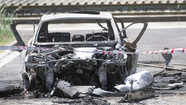 The burnt-out Porsche. Picture: Tony Gough