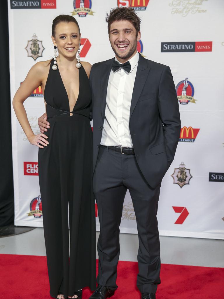 Sturt’s James Battersby with Abby Dollins. Picture: Dean Martin