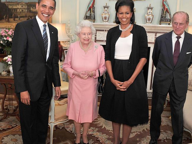 The royal couple meet then US president Barack Obama and his wife Michelle at . Buckingham Palace in 2009. Picture: AP Photo/John Stillwell