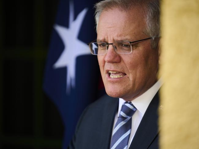 CANBERRA, AUSTRALIA - OCTOBER 07: Australian Prime Minister Scott Morrison speaks at a press conference outside the lodge on October 07, 2021 in Canberra, Australia. Morrison has said that today is a great day for Australia with NSW reaching 70% of people double vaccinated against COVID-19. (Photo by Rohan Thomson/Getty Images)