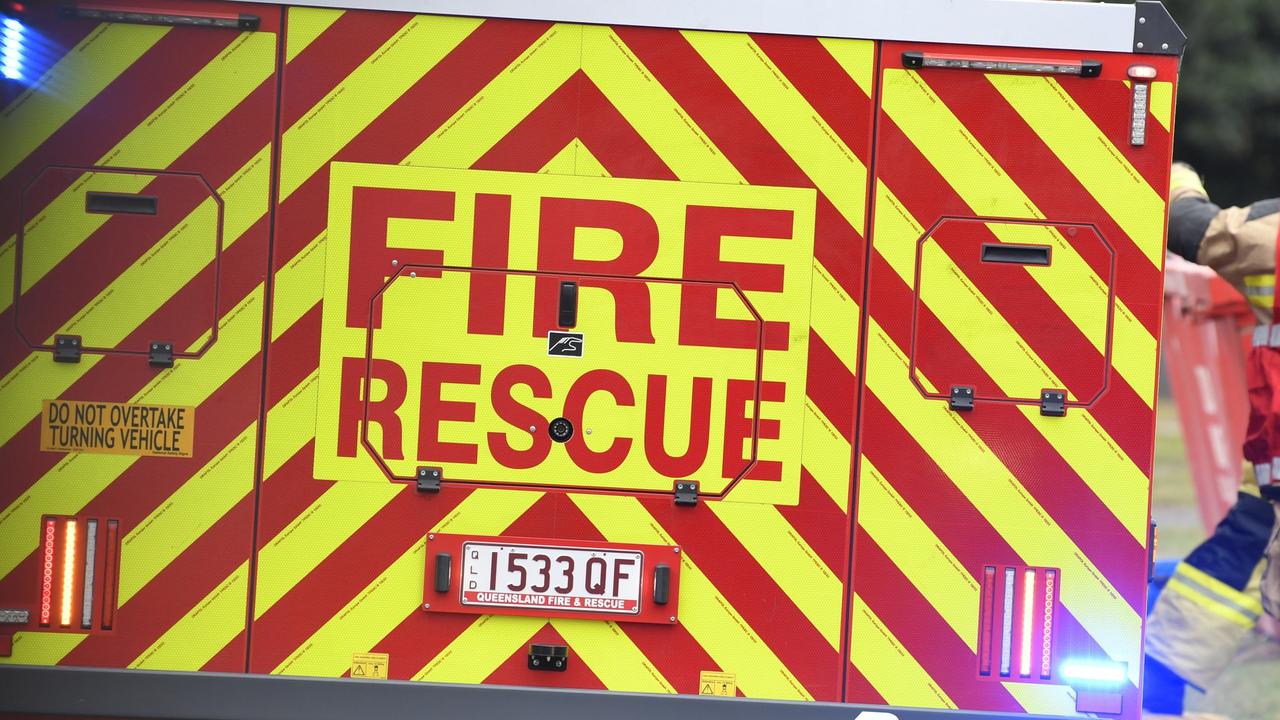 Firefighters rush to shed engulfed in flames