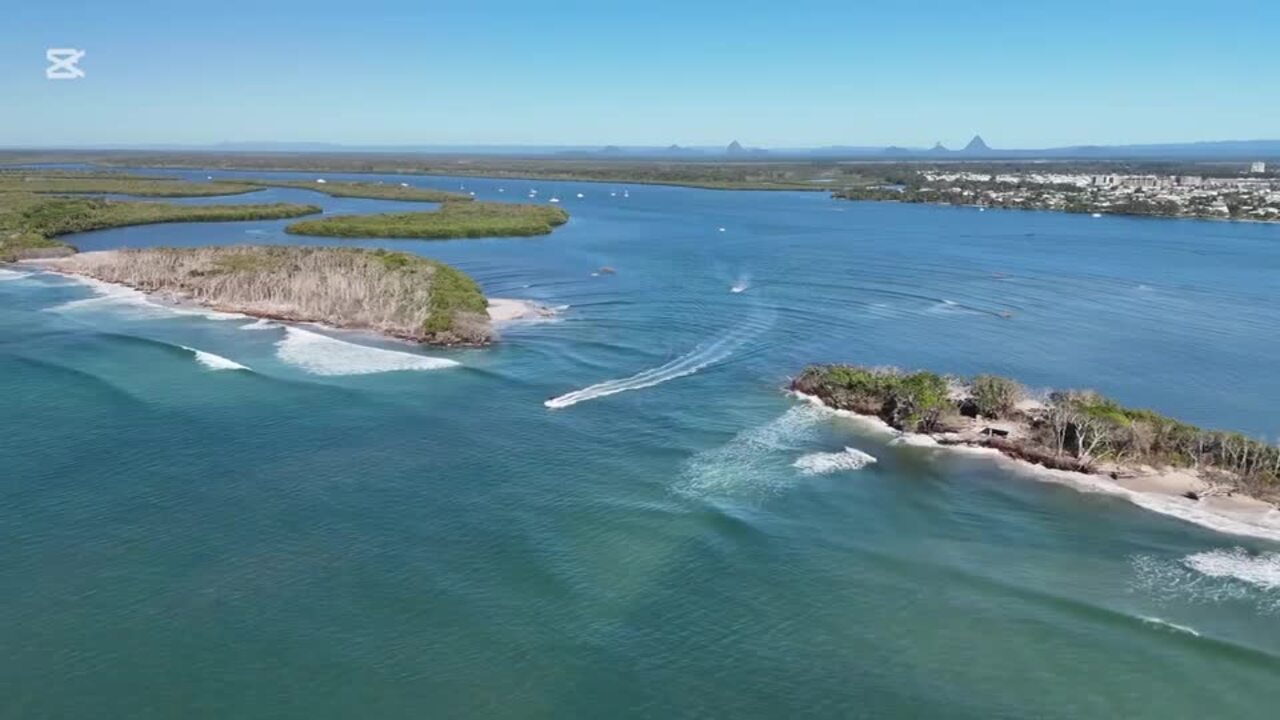 Drone vision of boat crossing second Bribie Island breakthrough