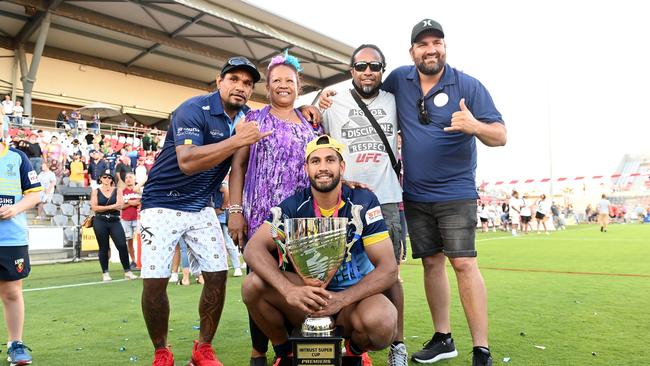 BRISBANE, AUSTRALIA - OCTOBER 10: Nene McDonald of the Devils celebrates victory with some of his family and friends after the 2021 QRL Intrust Super Cup Grand Final match between the Norths Devils and the Wynnum-Manly Seagulls at Moreton Daily Stadium on October 10, 2021, in Brisbane, Australia. (Photo by Bradley Kanaris/Getty Images)