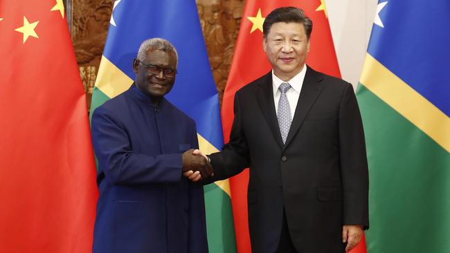 China’s President Xi Jinping greets Solomon Islands leader Manasseh Damukana Sogavare in Beijing in 2019. Picture: Getty Images