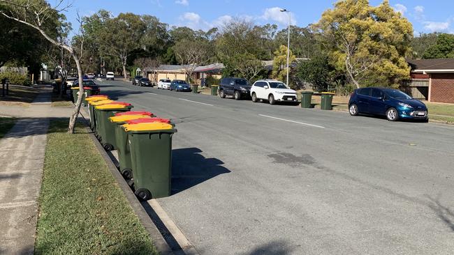 Rubbish bins placed on the road along Balcara Ave, Carseldine on collection day. Picture: David Willoughby