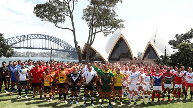 The Rugby League World Cup 9s teams line up in Sydney’s Royal Botanical Gardens on Wednesday. Picture: Brett Costello