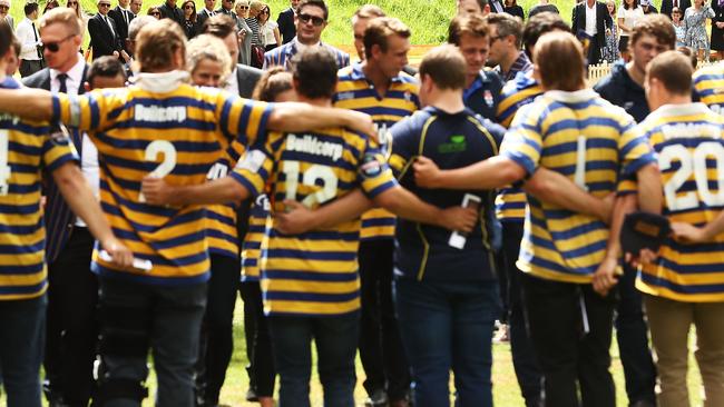 Old mates of the former player rally around. Picture: Getty Images