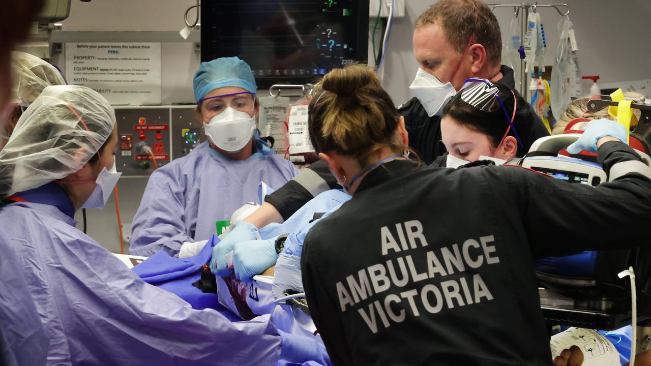 Medical staff prepare to operate on a patient. Picture: David Caird