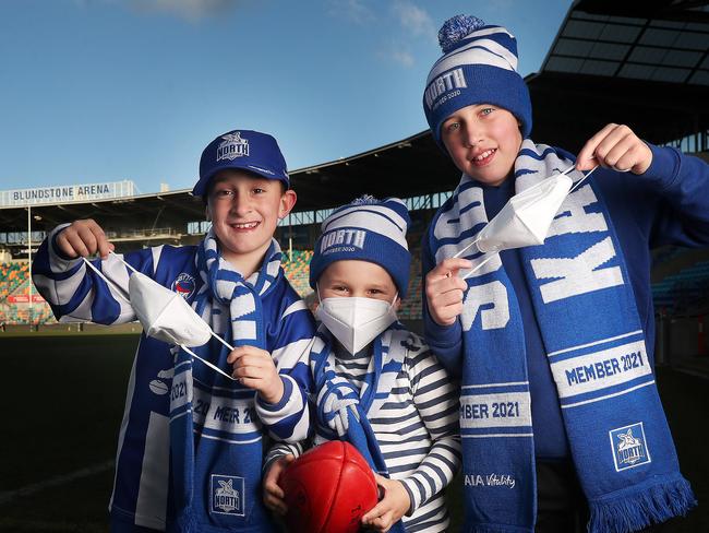 Hamish Reynolds 7, Lachie Reynolds 5 and Xavier Reynolds 11.  North Melbourne plays at Blundstone Arena this weekend with mask wearing mandatory for those 12 and over.  Picture: Nikki Davis-Jones