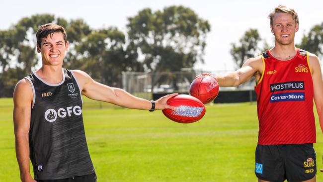 Port Adelaide's Connor Rozee with childhood friend Jack Lukosius. Picture: AAP/Russell Millard