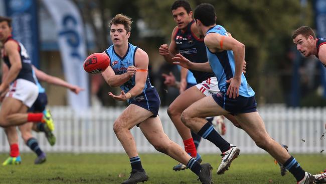 Sturt's Josh Hone gets a handball away. Picture Dean Martin