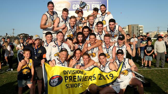 Whittlesea players celebrate their NFL Division 2 premiership. Picture: Hamish Blair