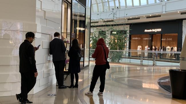 Shoppers queue outside the Chanel store at Chadstone.