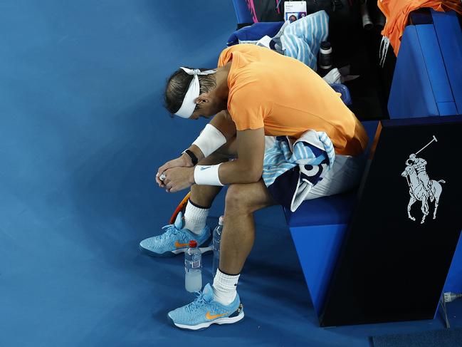 A dejected Rafael Nadal on Rod Laver Arena. Picture: Daniel Pockett/Getty