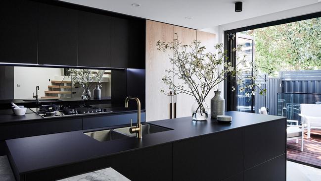 The kitchen opens out to an alfresco deck.