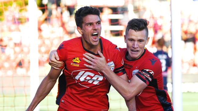 Adelaide United striker George Blackwood celebrates his late winner for the Reds against Central Coast Mariners. Picture: Daniel Kalisz/Getty Images