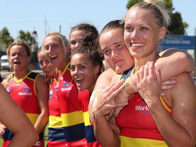 Crows co-captain Erin Phillips is hugged by teammate Sarah Perkins after the club’s round three win over Geelong at Norwood Oval in February. PHOTO: AFL Media