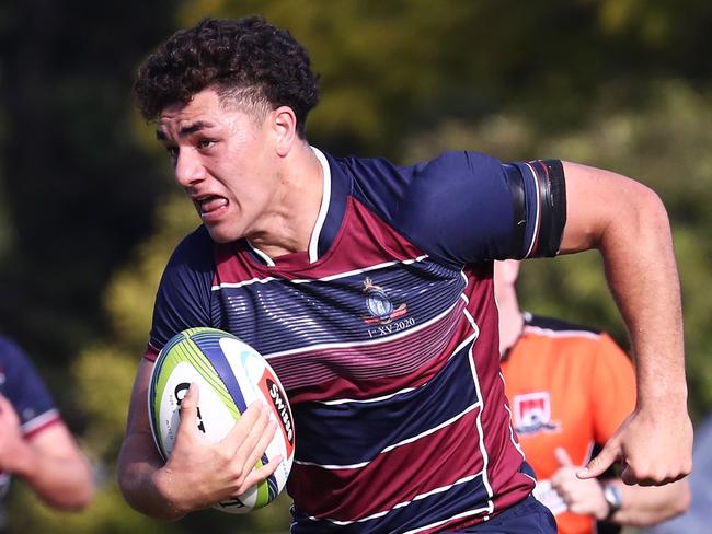 Jojo Fifita of TSS runs with the ball against BBC during their GPS Rugby clash.Photograph : Jason O'Brien