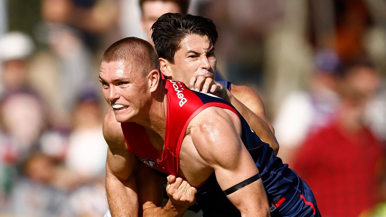 Adam Tomlinson getting busy for the Demons against Fremantle last year. Photo: Michael Willson/AFL Photos via Getty Images