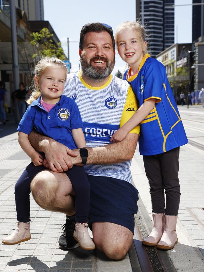 Scott Wing and his daughters Emma and Zoe. Picture: Richard Dobson