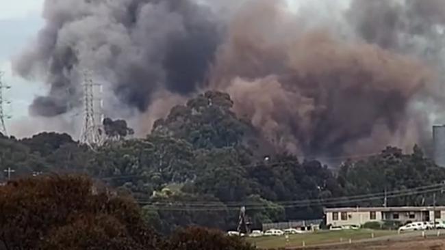 Smoke fills the air after the demolition.