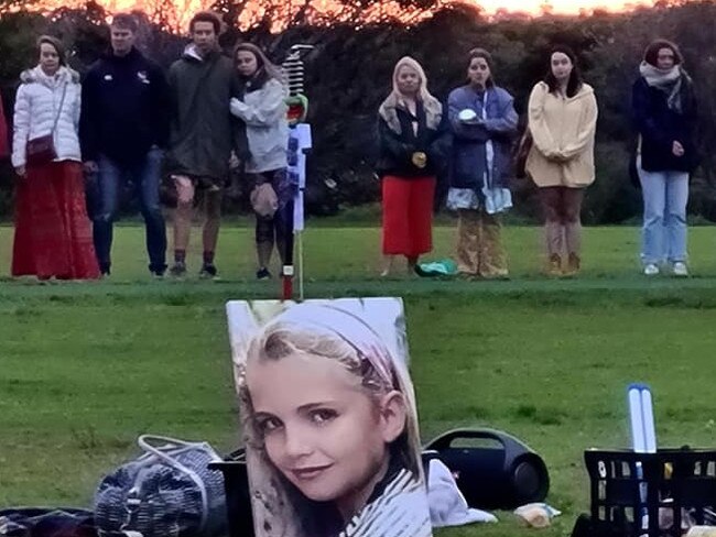 Family and friends attended a Sunday sunset memorial gathering at Tania Park, Balgowlah Heights, to remember Annika Ferry, 21, who died after falling at an abandoned military bunker on Sydney's North Head while watching a sunrise. Picture: Facebook/Roderic Fennell