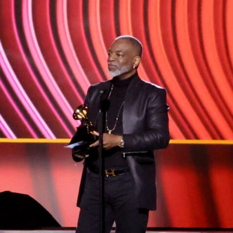 Grammys host LeVar Burton awkwardly accept the award on the disgraced comedian’s behalf. Picture: Supplied