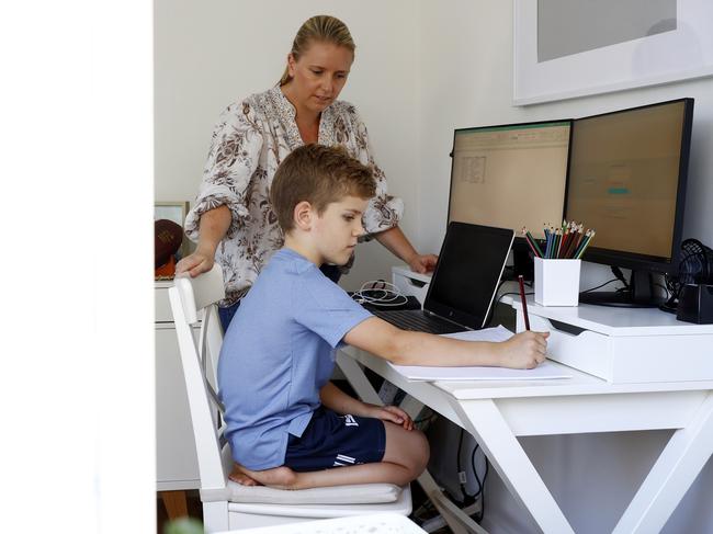 Tess Donohue with son Callum, who is learning from home during the COVID-19 pandemic. Picture: Sam Ruttyn