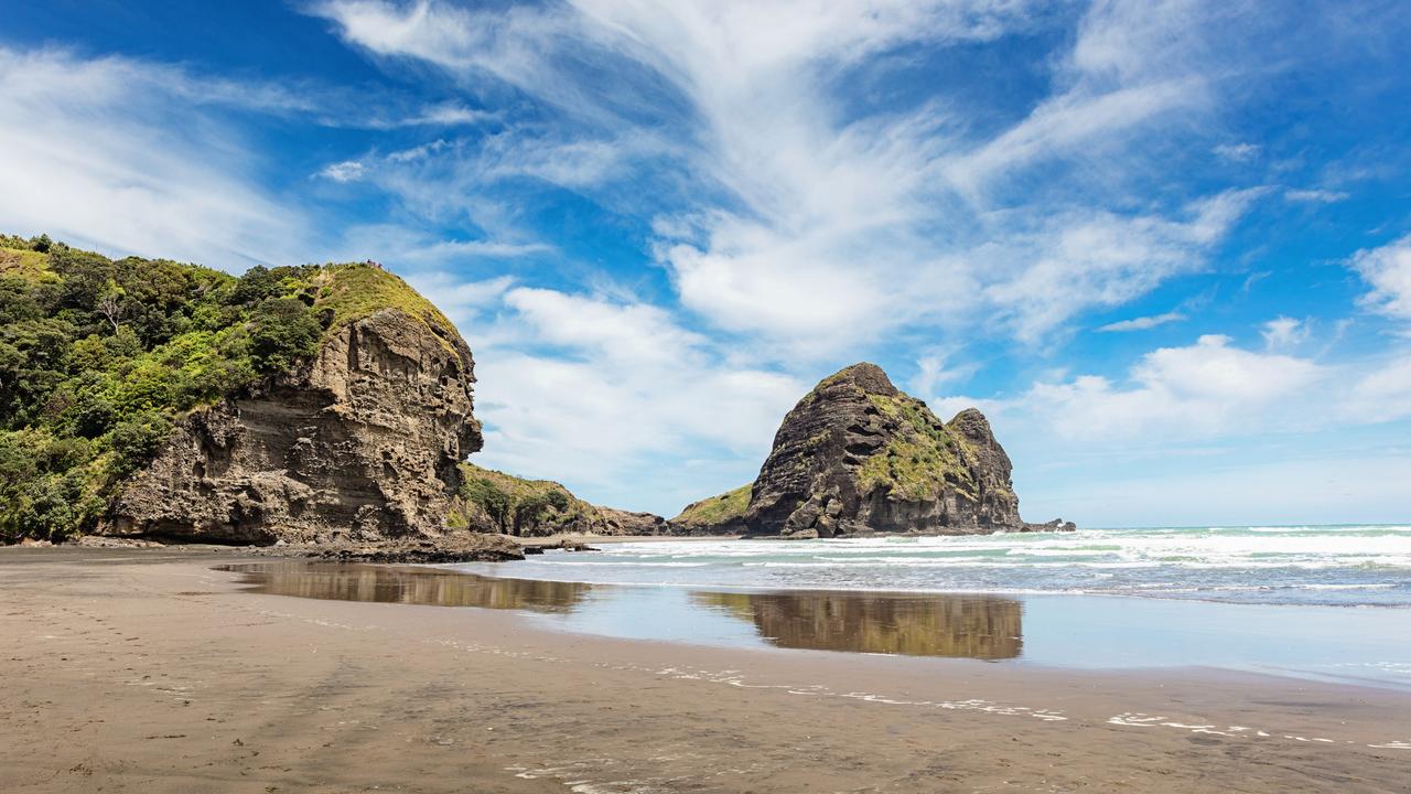 Piha Beach on the west coast of Auckland in New Zealand came first.