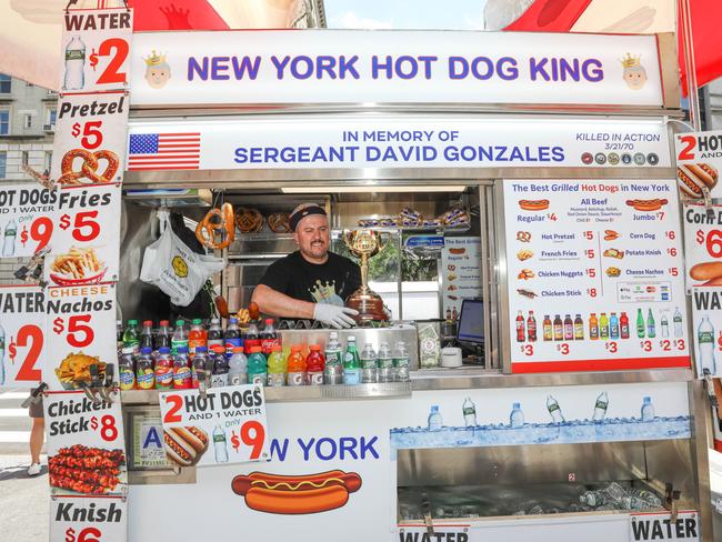 The Cup with hot dog vendor in New York City.