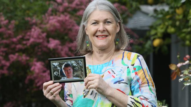 Hilary holds a picture of her son Callum, who died aged 19. Picture: Emma Brasier