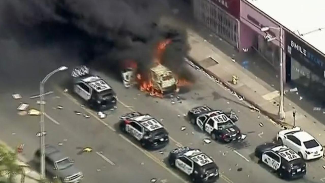 Several police cars have been trashed or burned. PictChannel 9 Nine