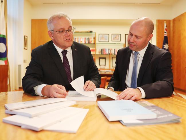 Prime Minister Scott Morrison and Treasurer Josh Frydenberg put the finishing touches on this year’s federal budget, to be handed down tonight. Picture: Adam Taylor/PMO